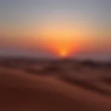 Vast desert landscape of Dubai showcasing dunes at sunset